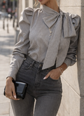 Gestreepte blouse met strikdetail