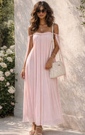 Zachtroze Maxi Jurk met Strikdetails en Transparante Schouderbandjes